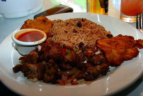 Rice and peas and fried goat