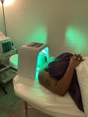 Disco facial, targeting hyperpigmentation and killing bacteria.