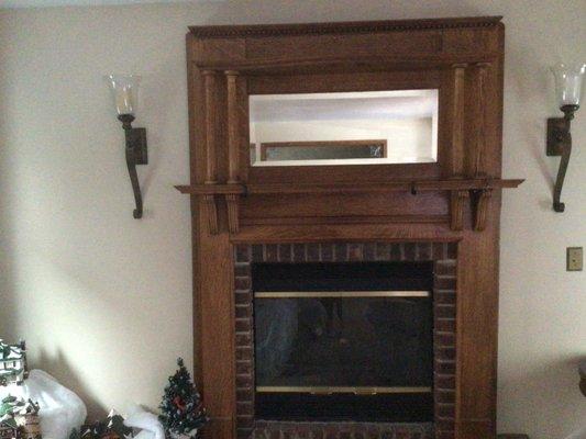 Solid oak antique fireplace. 8ft high, 5 ft wide.