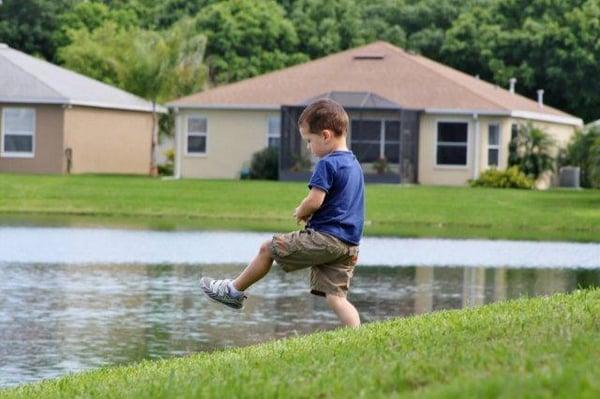 Peaceful surroundings and  what little boy doesn't like to run around and throw pebbles into the water!