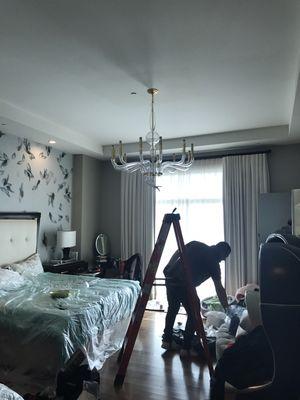 Install and assemble murano glass chandelier.