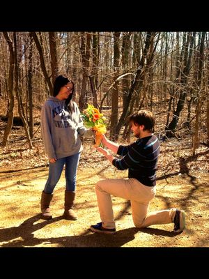 Proposals are better with flowers.