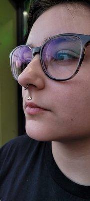 Happy, downsized philtrum with a Mercury Mist Topaz Pear Fan from Anatometal. Pierced by Kenny!