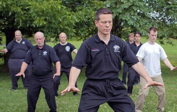 Taking advantage of a beautiful day in Maryville, Sigung Richard Clear led a small group through a Tai Chi set.