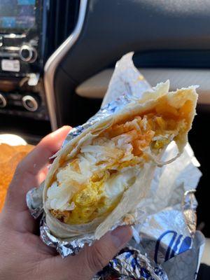 Loving this number 1 breakfast burrito and the invisible bacon I waited over an hour for.