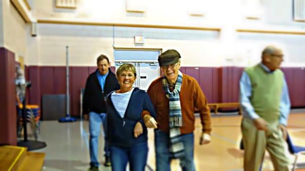 One of our founder's, Linda, helping with a cool down walk around the gym