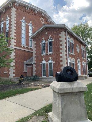 Unusual cannon outside original sheriff's house.