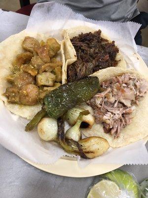 Chicharrón, barbacoa, and carnitas tacos