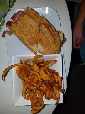 Italian panini and curly fries