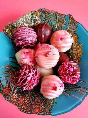 Strawberry cheesecake truffles. Available milk or white chocolate.