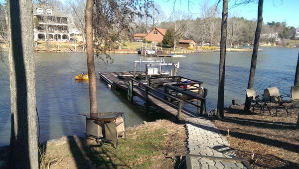 Picture 1 of a boat dock on Lake Wylie at the same home as the large stained deck.