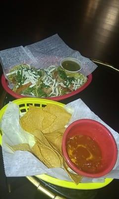 Complimentary chips & salsa & beef tacos!