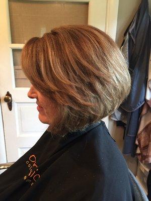 Organic highlights on an layered angled bob haircut.