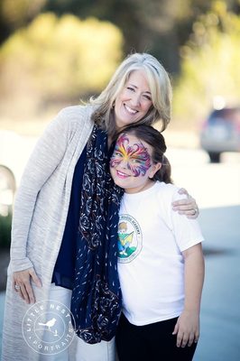 Lisa Young Palladino, owner of the Ballantyne Reading Academy of the Very Young, at her open house event that I painted at.