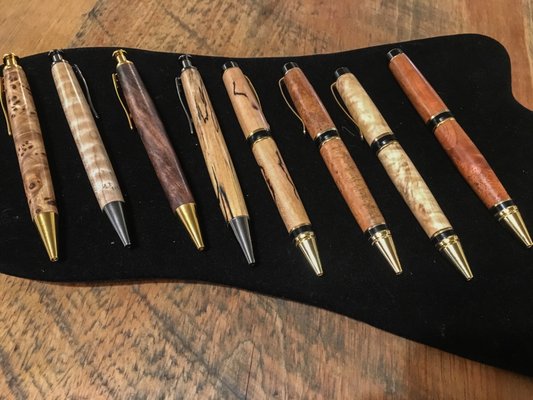 We sell local artisan crafts: wooden pens by Alex Pettigrew.