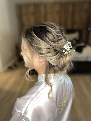 Side view of bridal updo textured style