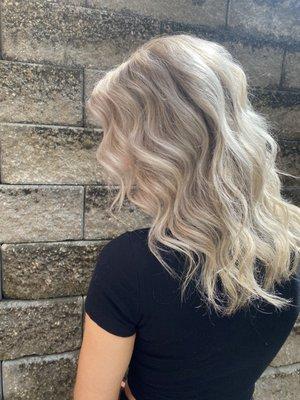 Full head of highlights with a icy blonde toner