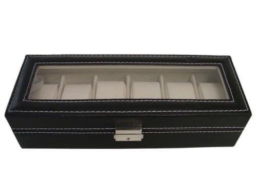 Black faux leather watch collectors box, holds six watches. The top of the box locks to keep watches safe.