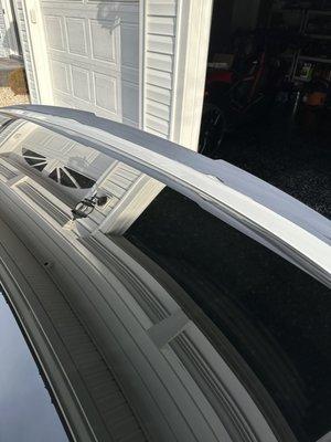 Full shot of spoiler that should have been wrapped correctly.  Poor instillation, cheap material and inexperienced installer.