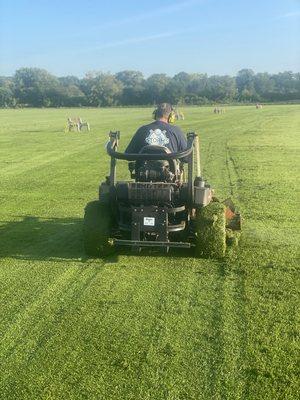 Practice tees mowed to country club standard