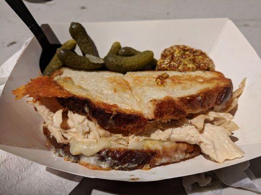 Chicken grilled cheese with grainy mustard and cornichon pickles. Didn't like the chicken though. Wanted pulled pork but they were out.