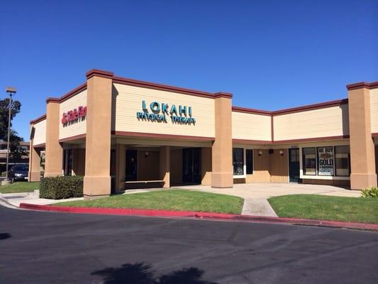 Front of business. Next door to State Farm in Coco's bakery plaza.