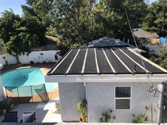 Installation of the new pool solar system.