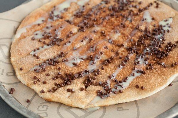 Satisfy your sweet tooth with our deliciously decadent Churro Pizza!