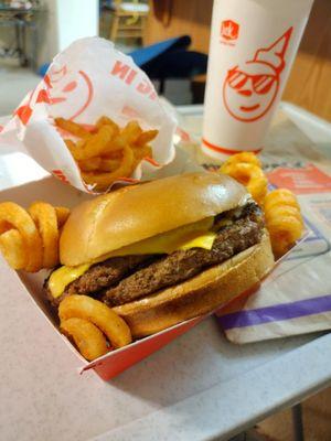 #9 Ultimate Cheeseburger combo with curly fries and a custom vanilla coke