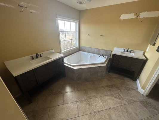 New tile on floor and tub! New sink and vanity as well