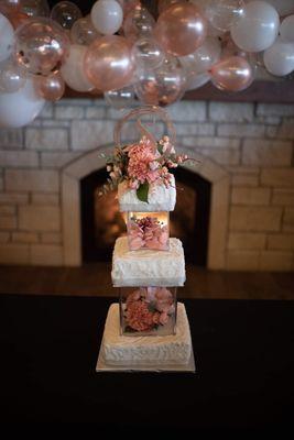 Our wedding cake that is almost all Steve's Floral flowers.