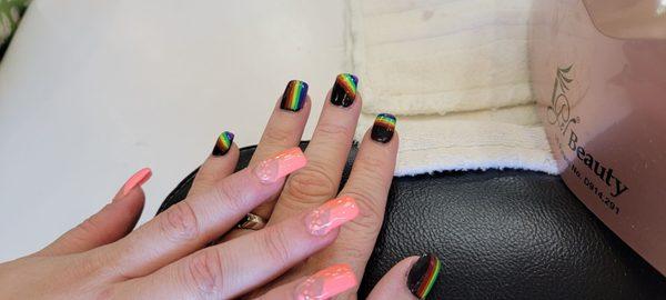 My daughter and my nails getting ready for Pride. Nail art on point