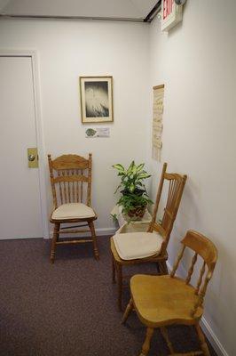 Well-lit hallway, stairs and entrance ways