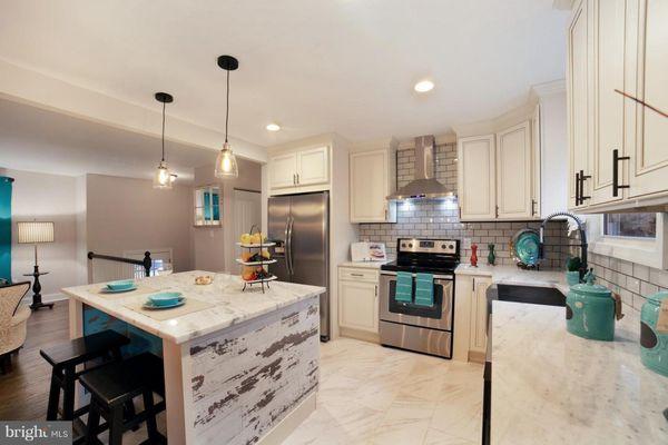 Another beautiful kitchen Done! Cream Cabinets and grey granite countertops