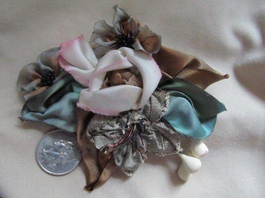 Boutonniere for your wedding with flowers that will never die - true heirlooms...and so much more...see michelesadornmentsandalterations.com