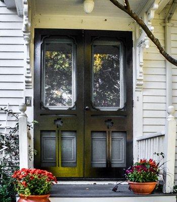 happy customer with our custom screen doors in Cambridge mass.