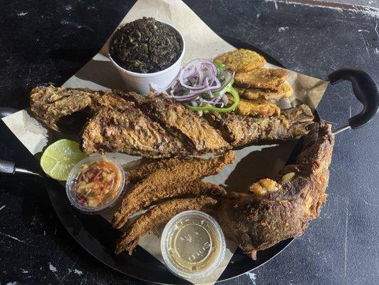 Fritay platter: diri djon djon, banan, fried ribs, Akra, and fried snapper