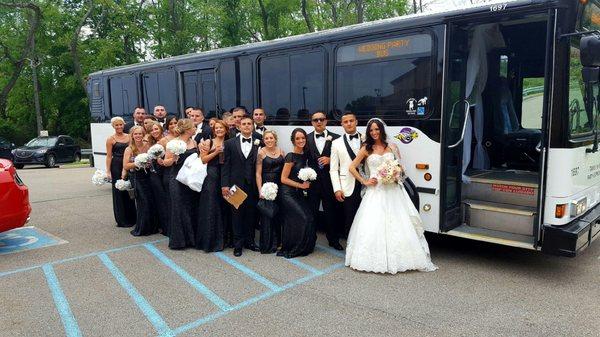 wedding party outside party bus