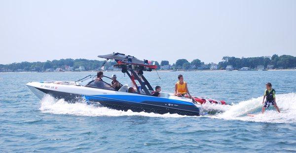 Wakesurfing in the Hamptons with Peconic Water Sports on a Chartered Wakeboarding Boat