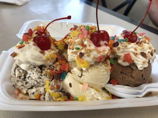 Father's Day Banana Split with chocolate, vanilla, and cookie dough ice cream. Don't forget the fruity pebbles and peanuts topping