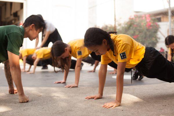 Teaching kung fu to youth.