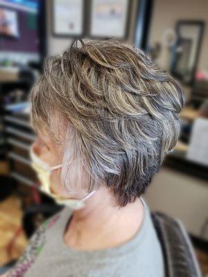 Added highlights to her dark natural grey hair to brighten it up!