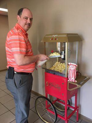 Enjoy a complimentary fresh bag of popcorn when you come visit us!