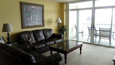 Living Room at Blue Water Keyes, Unit 1005