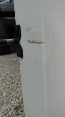 Damage on gatepost from sagging gate. Phil at R&C says caused by frost and isn't covered by them. Only year 2 of fence.