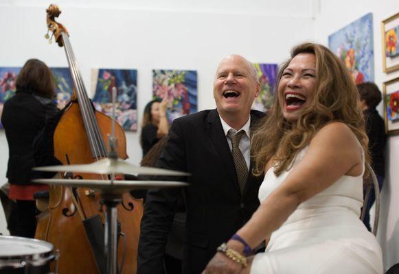 Artist Charisse Abellana and jazz guitarist David Eastlee take a break during the reception last March 10th.  (Photo by Hector Felix)