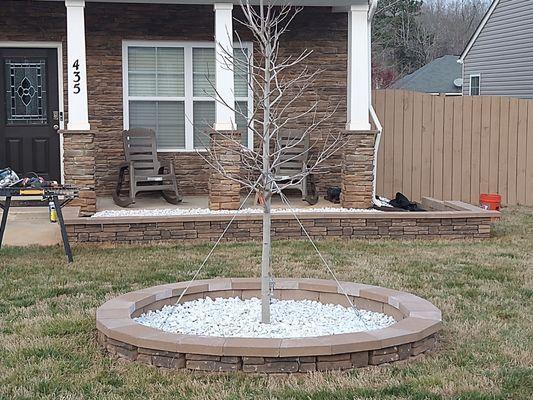 Brian and Sarah do wonderful work. As you can see they are still working on the retaining wall around the flower bed