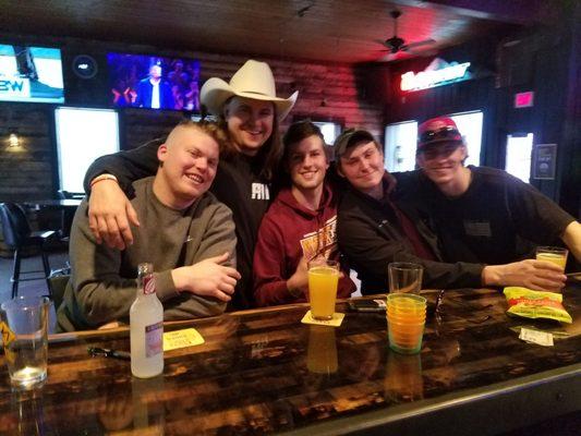 Friends having a large time at the Golden Spike.