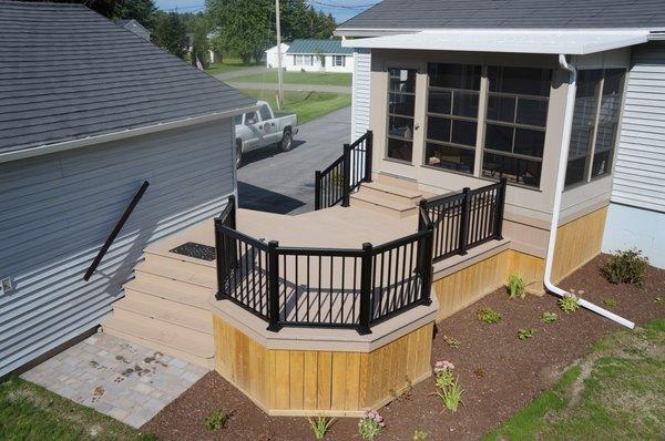 M-200 3-Season Sunroom with a Low Maintenace Custom Deck.