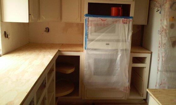 This stage is after the initial tear out of existing counter top and preparing for new granite counter top install.